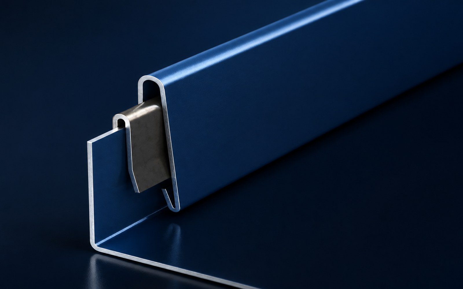 Close-up profile render of a Drexel snap-lock standing seam panel showing the self-locking nailstrip seam on a dark background