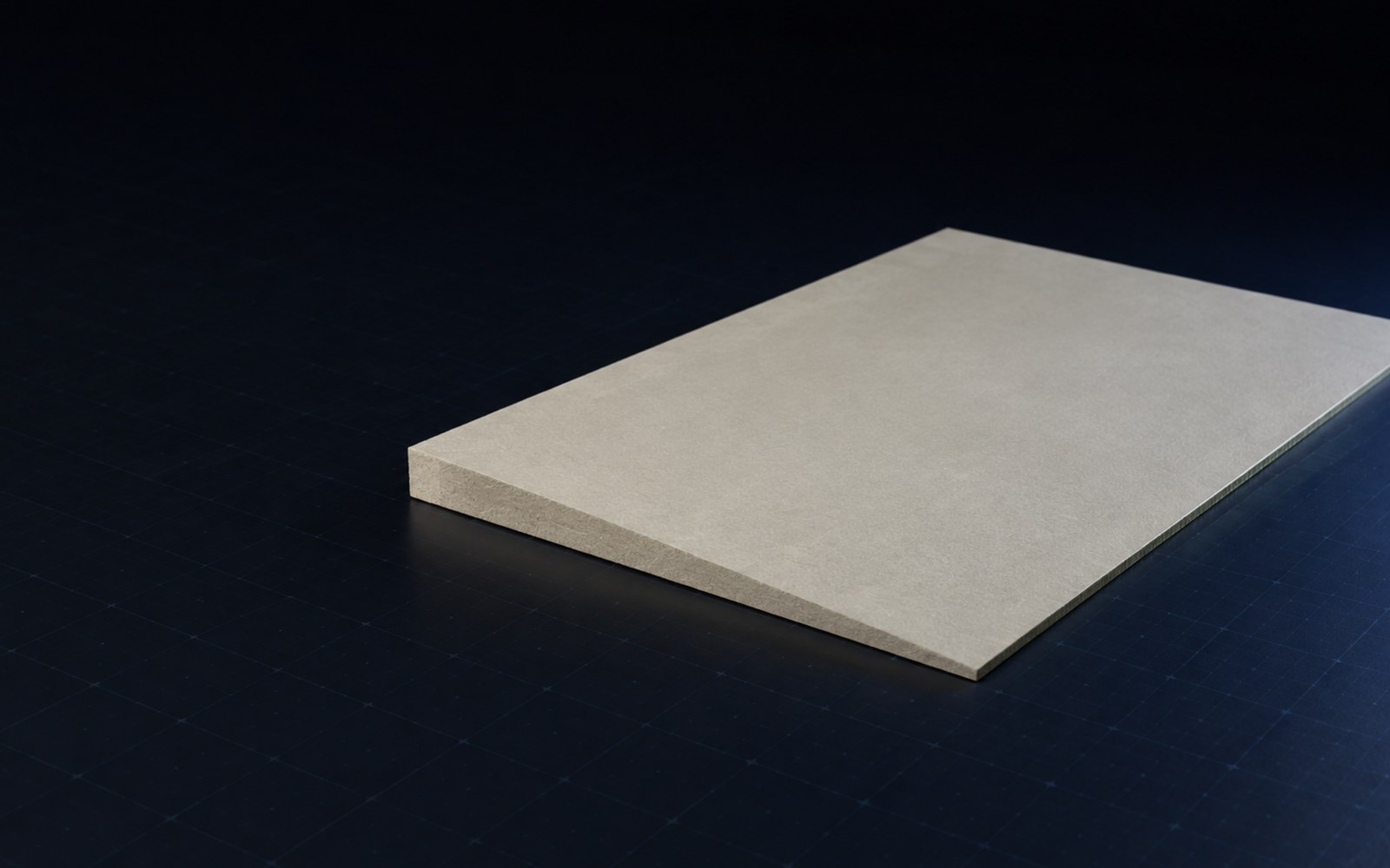 Tapered ACFoam polyiso insulation board showing a wedge-profile sloped face on a dark background